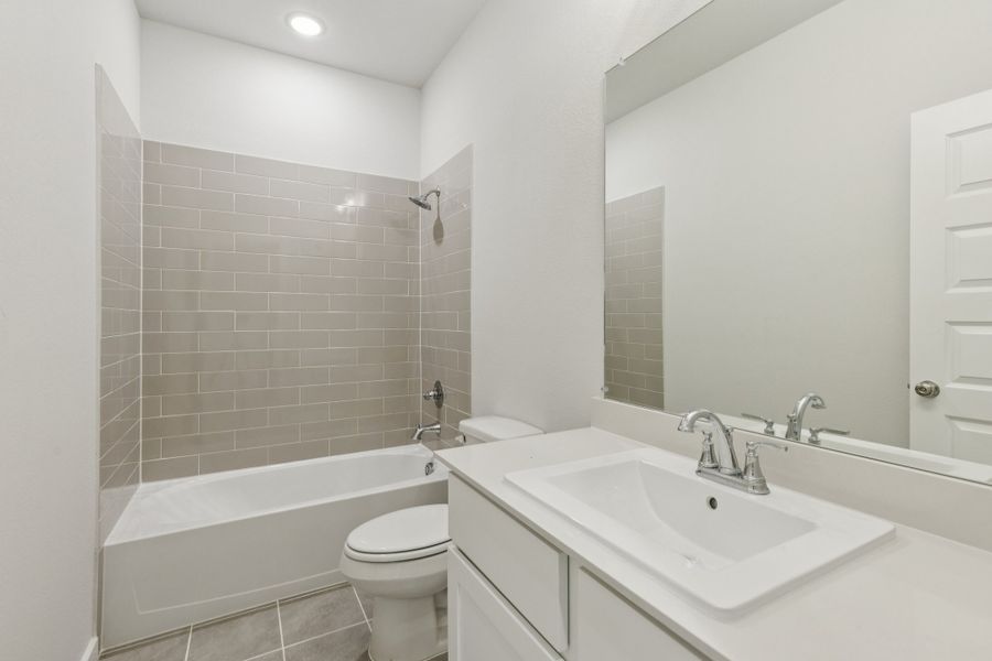 Bathroom in the Masters home plan by Trophy Signature Homes – REPRESENTATIVE PHOTO Bathroom in the Masters home plan by Trophy Signature Homes – REPRESENTATIVE PHOTO