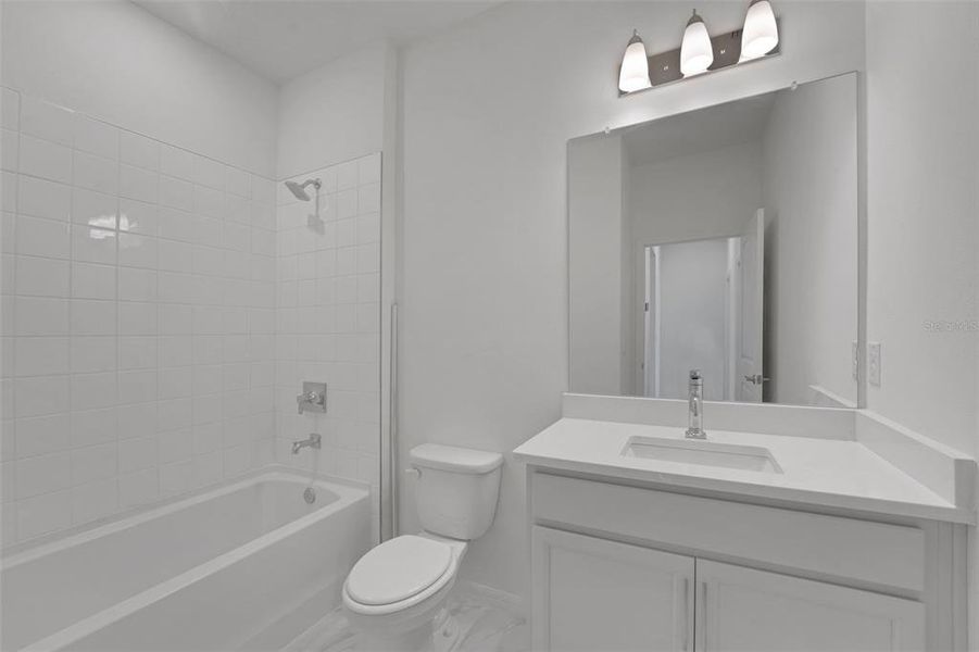 Furnished interior view inside a new home in Tuscan Hills, Dade City (Image 7).