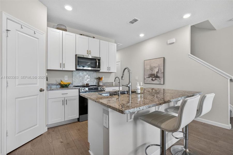 Furnished interior view inside a new home in , Stuart (Image 13). Furnished interior view inside a new home in , Stuart (Image 13).