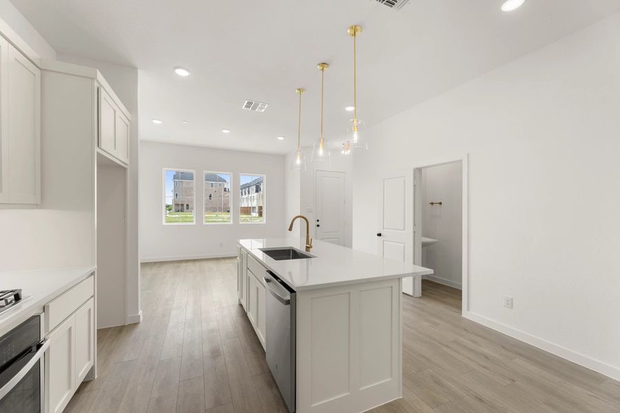 Open Kitchen-Living-Dining Room featuring the Serene Collection