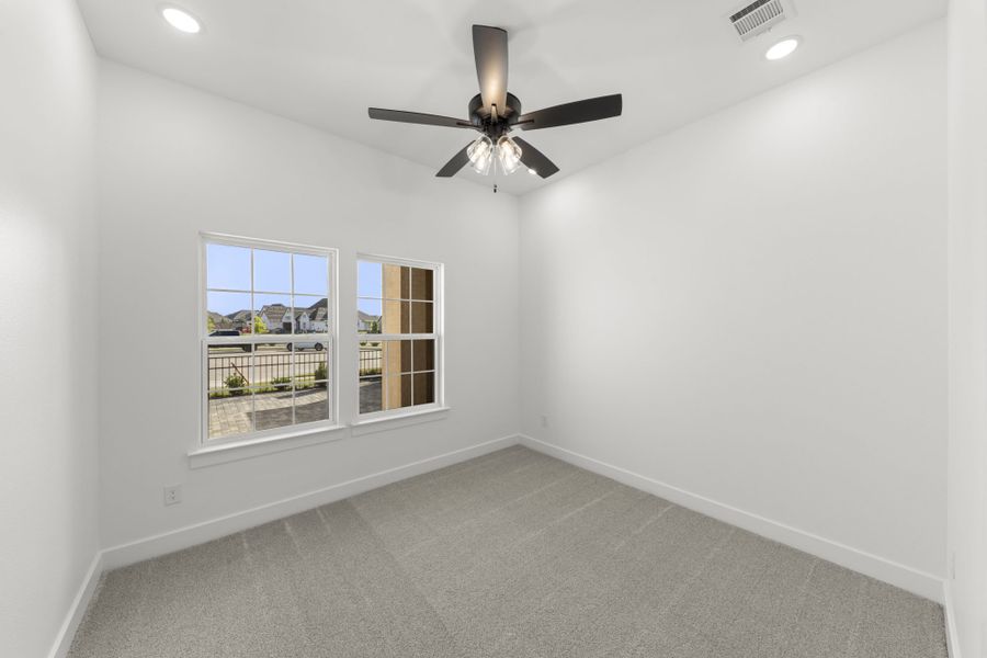 Representative unfurnished interior of a home built from the 5521 by Tradition Homes in Windsong Ranch, Prosper (Image 13).