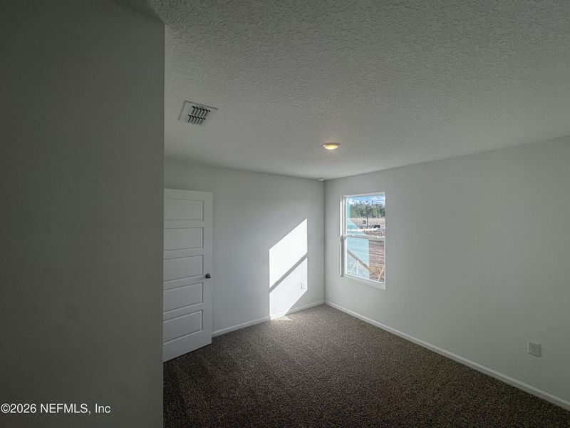 Spacious, unfurnished interior of a new home in The Arbors, Jacksonville (Image 41).