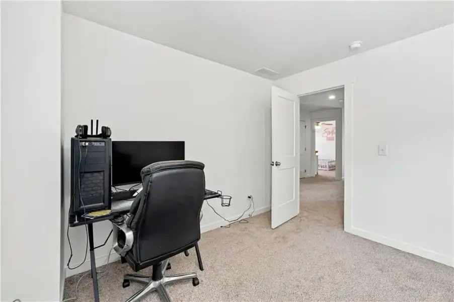 Furnished interior view inside a new home in Sutton’s Landing, Statham (Image 34).
