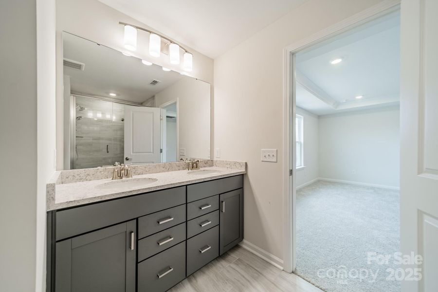 Furnished interior view inside a new home in Stewarts Landing, Charlotte (Image 13).