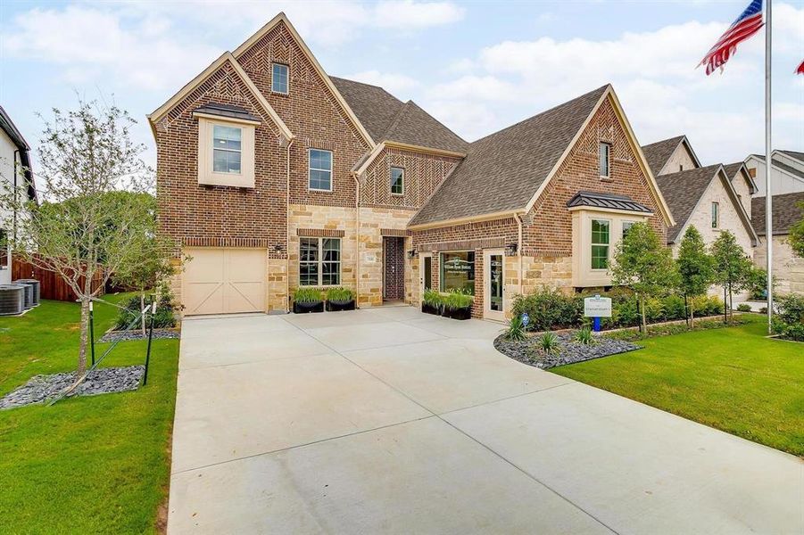 Front exterior of a new home in Aster Park, McKinney, TX, highlighting curb appeal (Image 21).