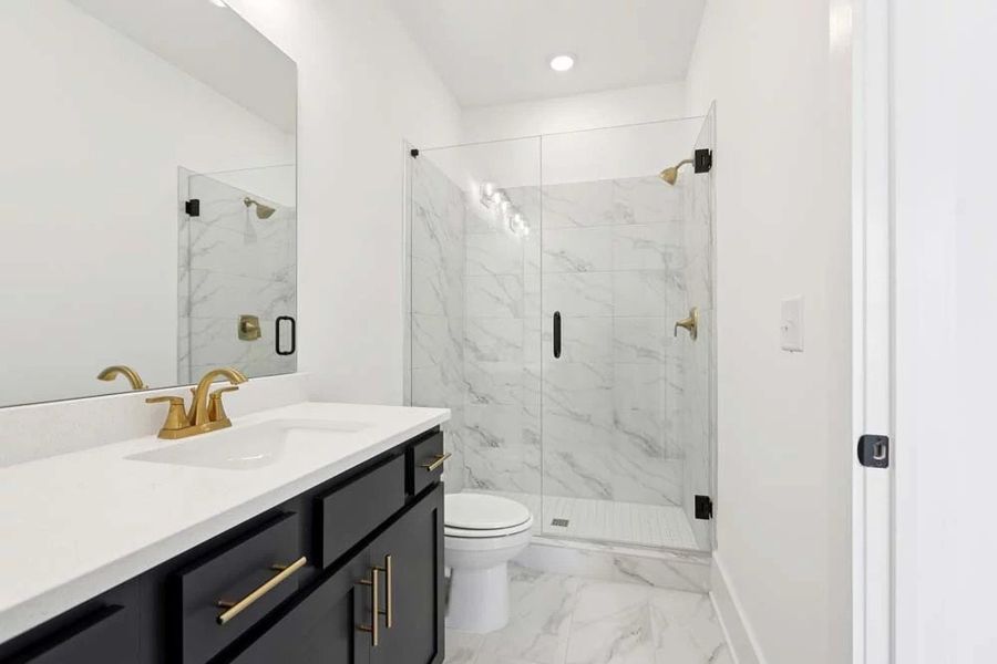 Primary Bathroom Walk-In Shower featuring Luxe Collection Finishes Primary Bathroom Walk-In Shower featuring Luxe Collection Finishes