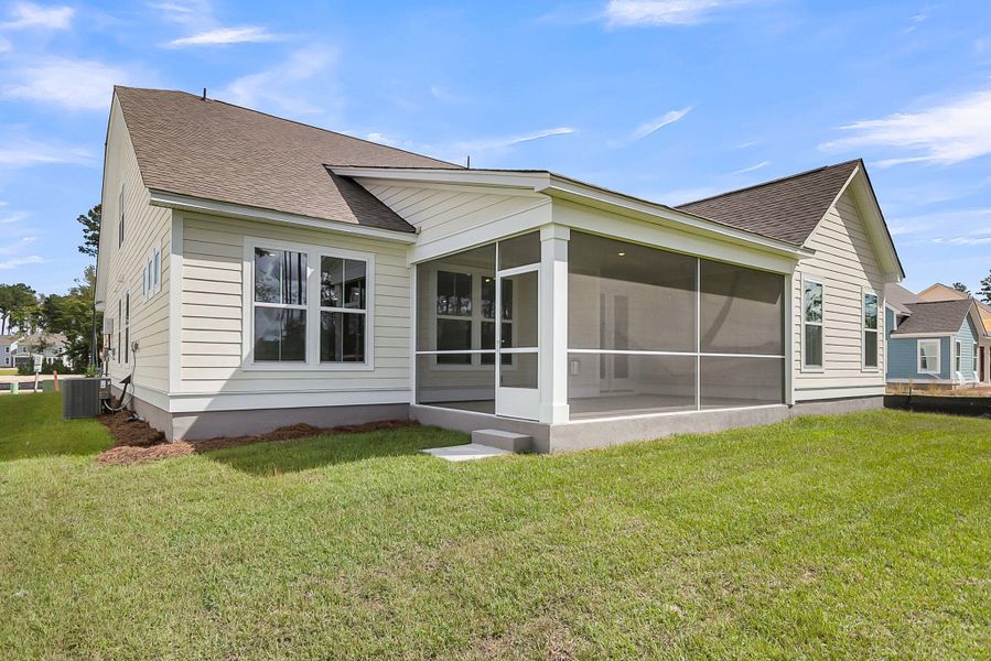 Exterior details and patio area of a home in Tidewater at Lakes of Cane Bay, Summerville (Image 2). Exterior details and patio area of a home in Tidewater at Lakes of Cane Bay, Summerville (Image 2).