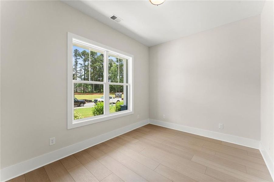 Spacious, unfurnished interior of a new home in Hillgrove Preserve, Powder Springs (Image 40).