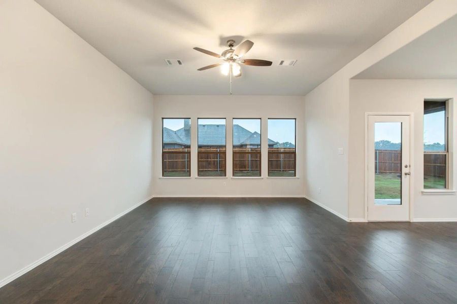 Family Room | Concept 2844 at Hunters Ridge in Crowley, TX by Landsea Homes