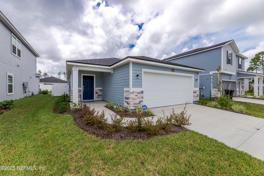 Front exterior of a new home in , St. Augustine, FL, highlighting curb appeal (Image 19). Front exterior of a new home in , St. Augustine, FL, highlighting curb appeal (Image 19).