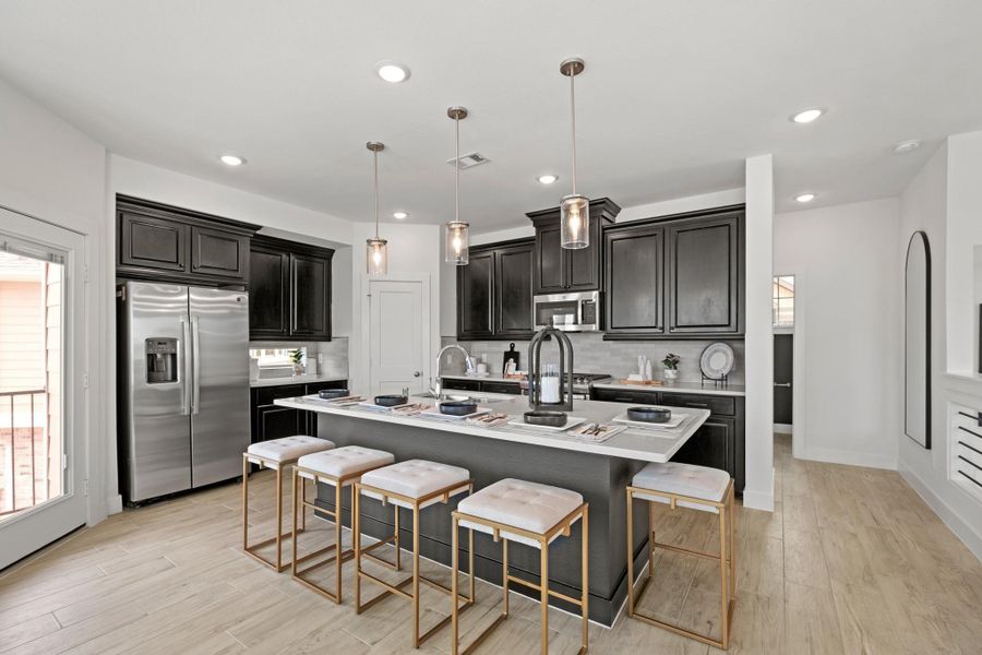 Furnished interior view inside a new home in Elyson, Katy (Image 13).