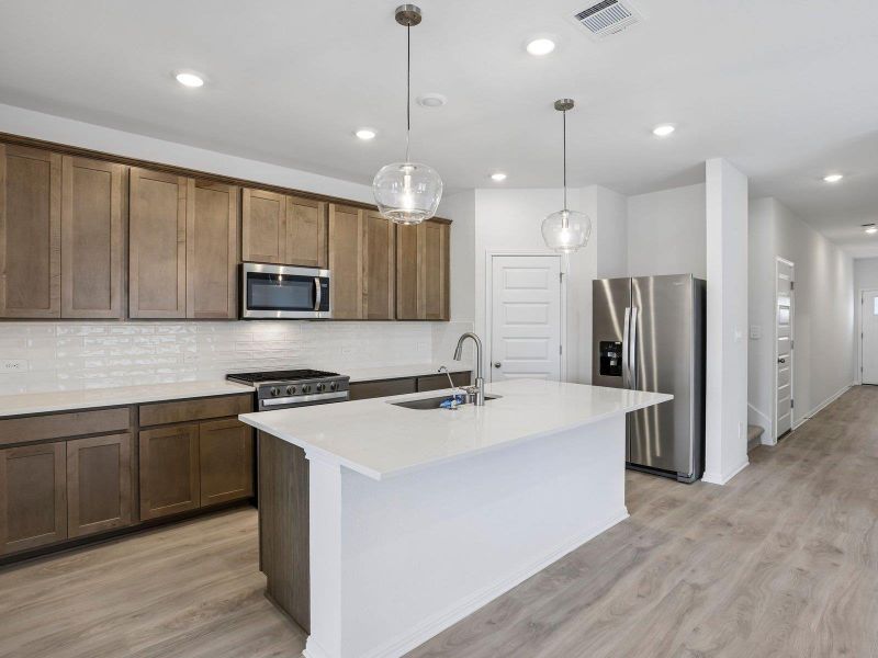 Photo is not of the actual home, but is an inspirational photo of builder’s model home and may depict options, furnishings, and/or decorator features that are not included