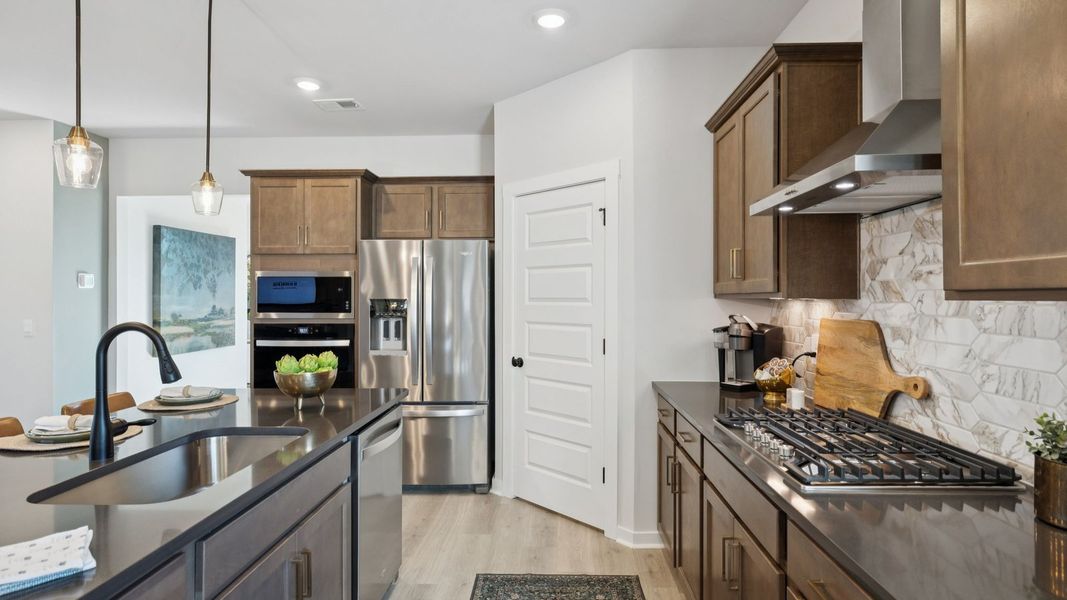 Furnished interior view inside a new home in Harvest Point, Spring Hill (Image 17). Furnished interior view inside a new home in Harvest Point, Spring Hill (Image 17).