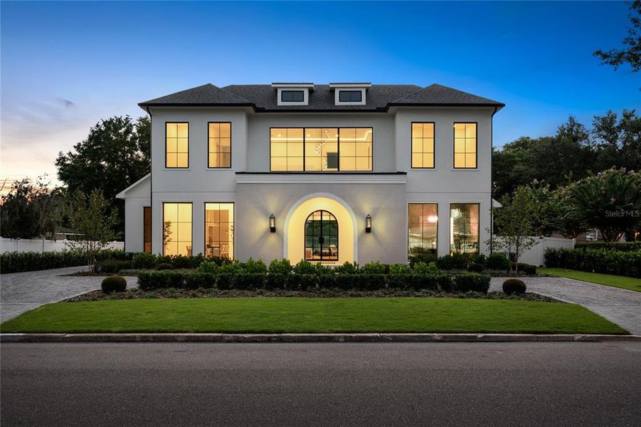 Front exterior of a new home in , Winter Park, FL, highlighting curb appeal (Image 28). Front exterior of a new home in , Winter Park, FL, highlighting curb appeal (Image 28).