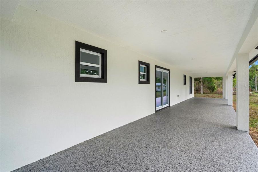 Exterior details and patio area of a home in , Okeechobee (Image 25).