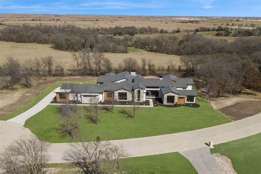 Front exterior of a new home in , Aledo, TX, highlighting curb appeal (Image 2). Front exterior of a new home in , Aledo, TX, highlighting curb appeal (Image 2).