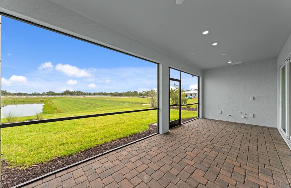Exterior details and patio area of a home in Shores at Stillwater, Englewood (Image 3).