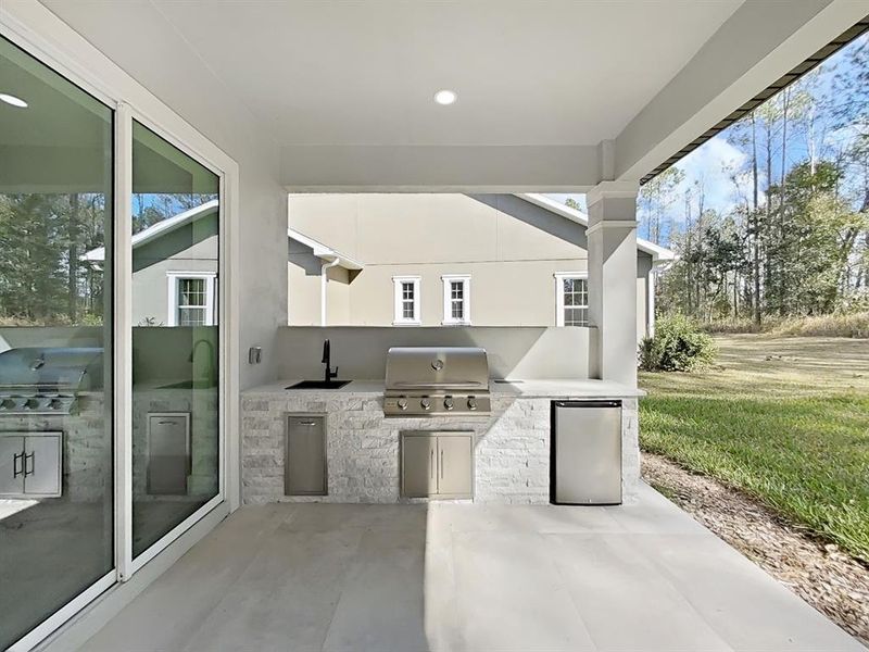 Exterior details and patio area of a home in , Brooksville (Image 19).