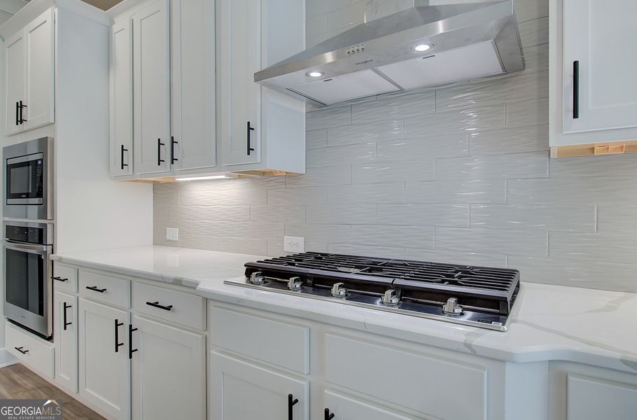 Furnished interior view inside a new home in Ponderosa Farms Reserve, Gainesville (Image 8).