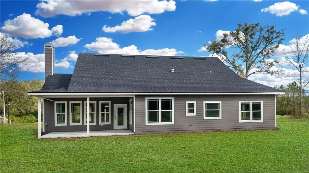Exterior details and patio area of a home in , Live Oak (Image 4).