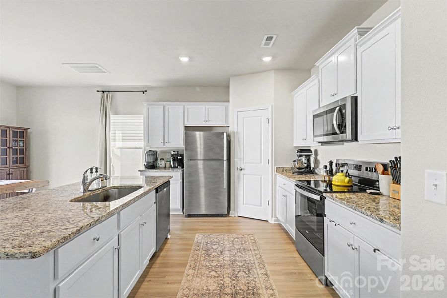 Furnished interior view inside a new home in McKee Creek Village, Charlotte (Image 19).