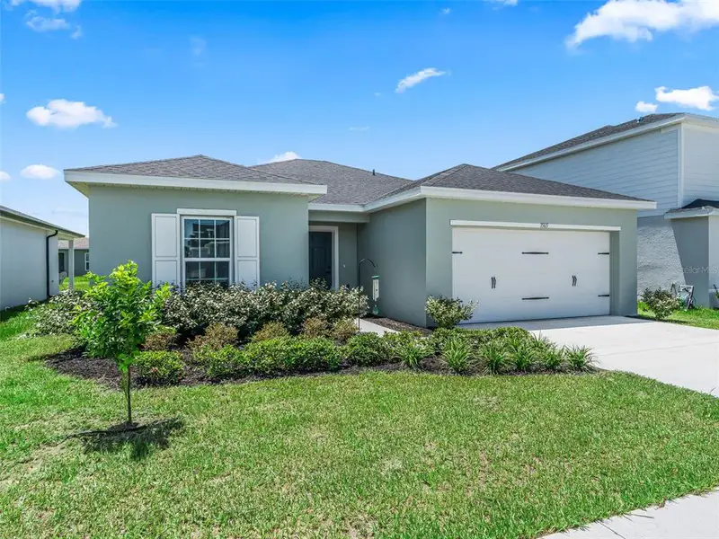 Front exterior of a new home in , Sumterville, FL, highlighting curb appeal (Image 22).