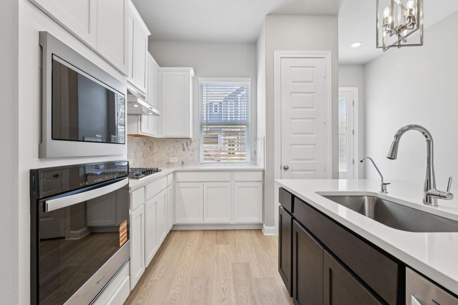 Furnished interior view inside a new home in Kemah Crossing - Luxe Series, Kemah (Image 5). Furnished interior view inside a new home in Kemah Crossing - Luxe Series, Kemah (Image 5).