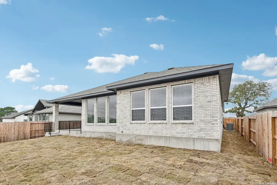 Exterior details and patio area of a home in Village at Three Oaks, Seguin (Image 3). Exterior details and patio area of a home in Village at Three Oaks, Seguin (Image 3).