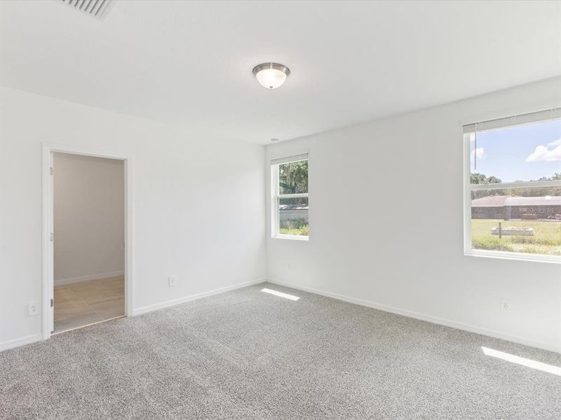 Spacious, unfurnished interior of a new home in The Meadow at Crossprairie, St. Cloud (Image 11).