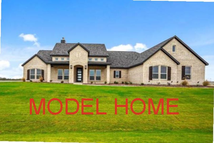 Front exterior of a new home in Rocky Top Ranch, Reno, TX, highlighting curb appeal (Image 1). Front exterior of a new home in Rocky Top Ranch, Reno, TX, highlighting curb appeal (Image 1).