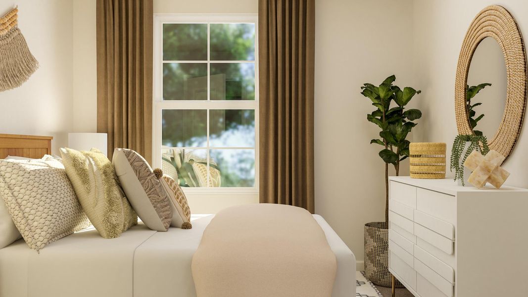 A white couch with pillows.