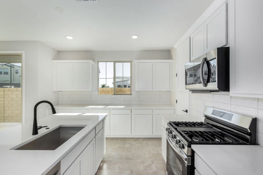 Furnished interior view inside a new home in Solvida at Estrella, Goodyear (Image 8).