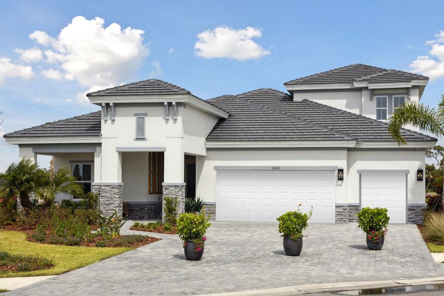 Representative exterior photo of a completed home built from the Biscayne II by Homes by WestBay in North River Ranch, Parrish, FL (Image 22).