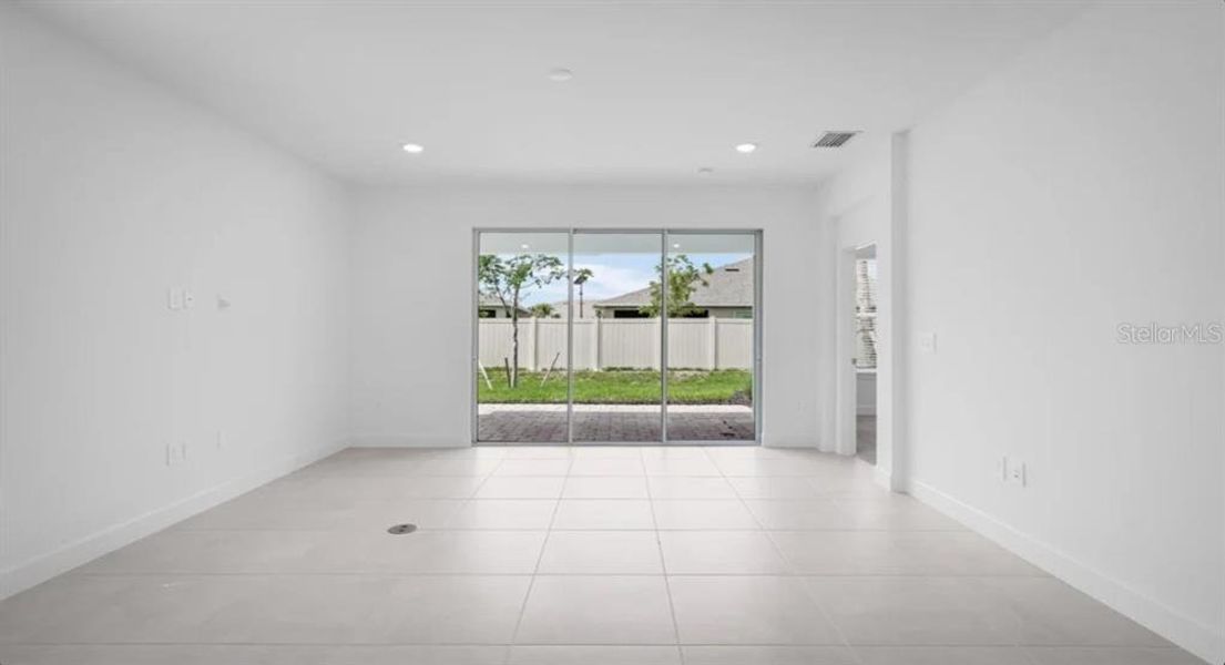 Spacious, unfurnished interior of a new home in The Cove at West Port, Port Charlotte (Image 21).
