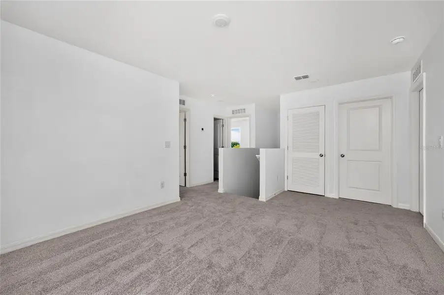 Spacious, unfurnished interior of a new home in , Port Charlotte (Image 43).
