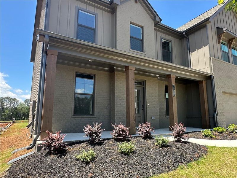 Front exterior of a new home in Summerlin, Winder, GA, highlighting curb appeal (Image 28). Front exterior of a new home in Summerlin, Winder, GA, highlighting curb appeal (Image 28).
