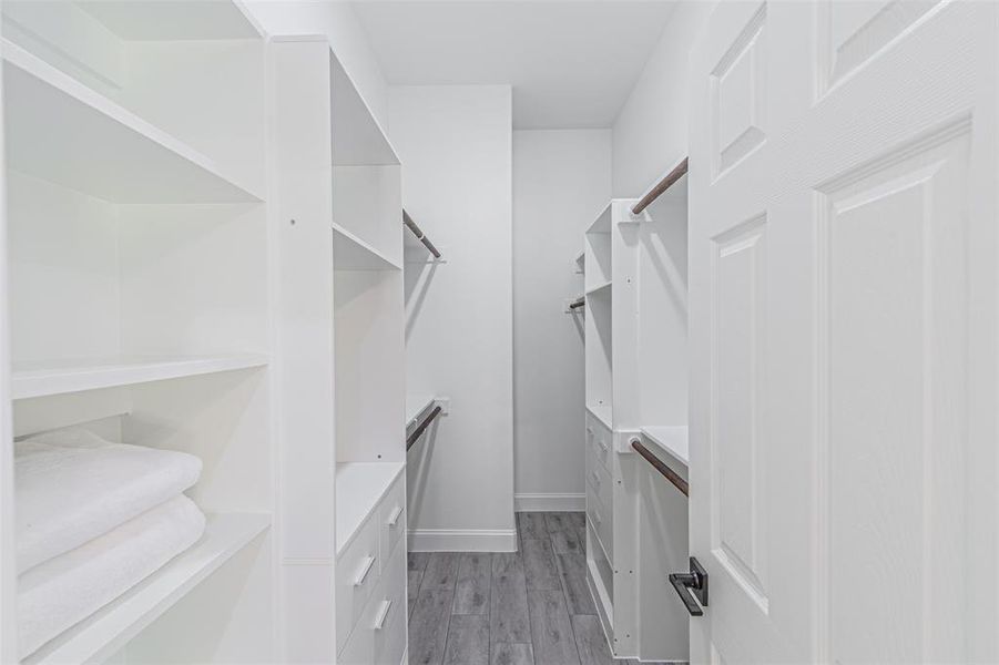 Custom walk-in closet in Primary bedroom