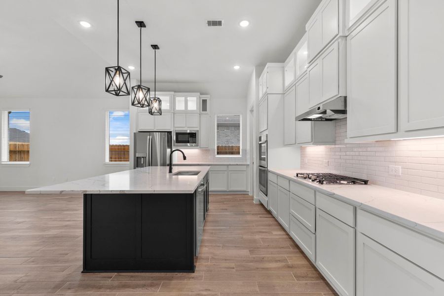 Furnished interior view inside a new home in Blue Heron, Mont Belvieu (Image 9).