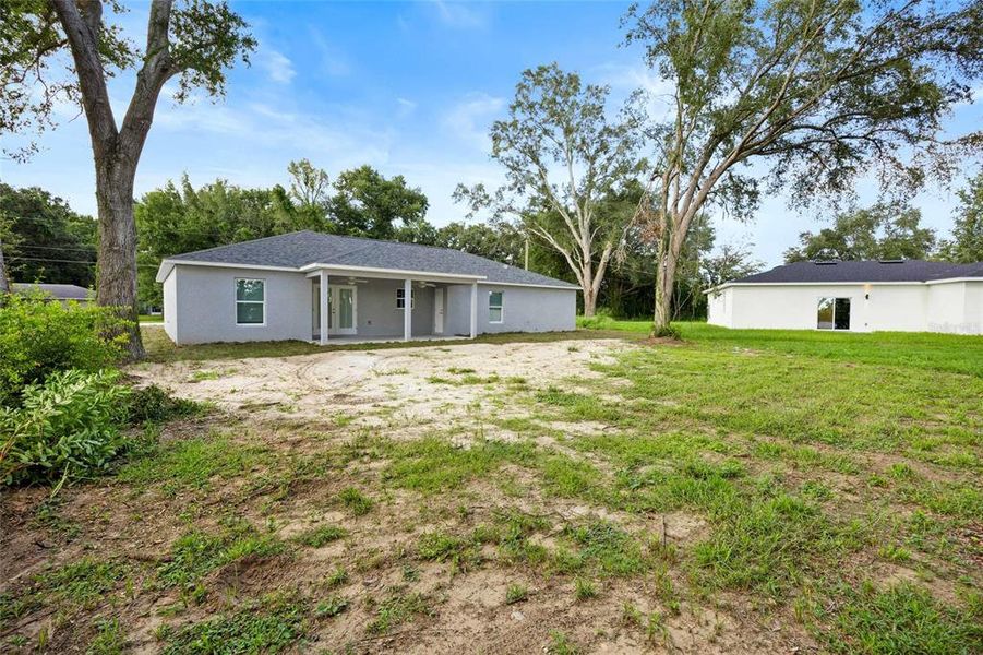 Front exterior of a new home in , Ocala, FL, highlighting curb appeal (Image 27). Front exterior of a new home in , Ocala, FL, highlighting curb appeal (Image 27).