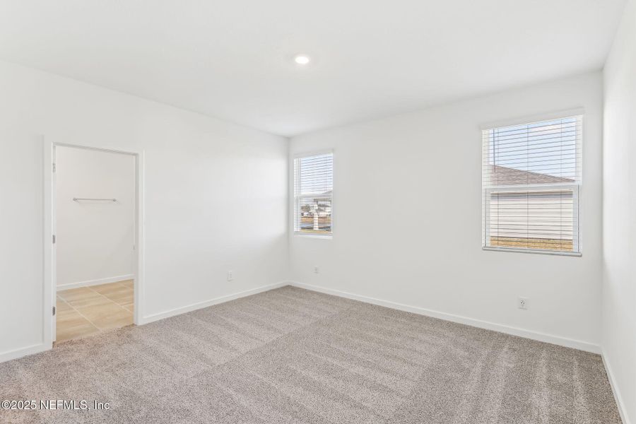 Spacious, unfurnished interior of a new home in Lakes at Bella Lago - Signature Series, Green Cove Springs (Image 25). Spacious, unfurnished interior of a new home in Lakes at Bella Lago - Signature Series, Green Cove Springs (Image 25).