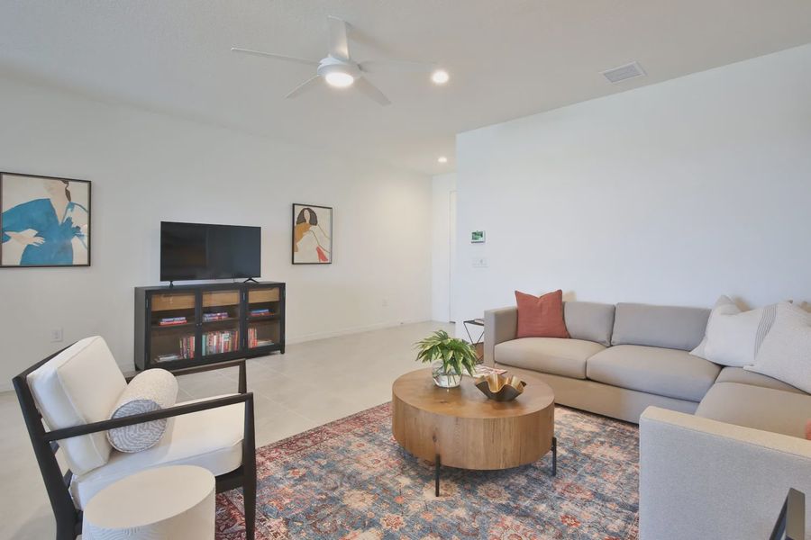 Representative furnished interior of a home built from the Morgan by Neal Communities in SkySail, Naples (Image 26).