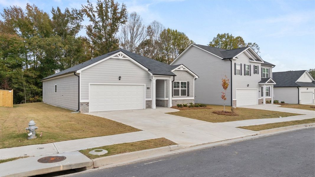 Front exterior of a new home in WillowBrook, Bethlehem, GA, highlighting curb appeal (Image 19). Front exterior of a new home in WillowBrook, Bethlehem, GA, highlighting curb appeal (Image 19).
