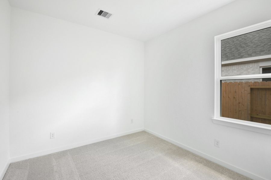 Spacious, unfurnished interior of a new home in Raburn Reserve 50s, Tomball (Image 26).