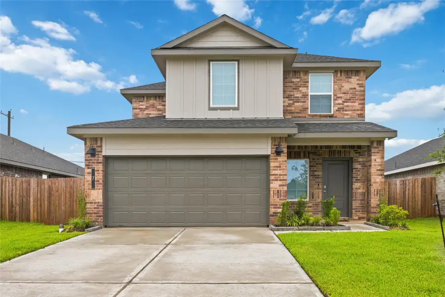 Two-car garage and wide driveway. Two-car garage and wide driveway.