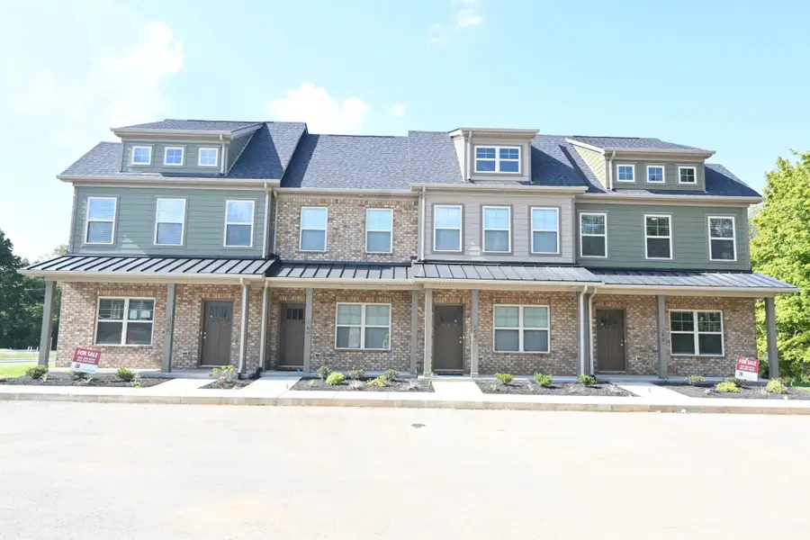 Front exterior of a new home in Talia Trace, Smyrna, TN, highlighting curb appeal (Image 1). Front exterior of a new home in Talia Trace, Smyrna, TN, highlighting curb appeal (Image 1).