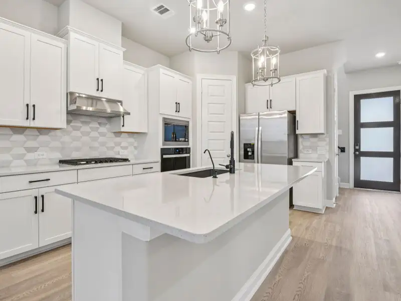 Furnished interior view inside a new home in Pinewood Trails - Luxe Series, Atascocita (Image 4). Furnished interior view inside a new home in Pinewood Trails - Luxe Series, Atascocita (Image 4).