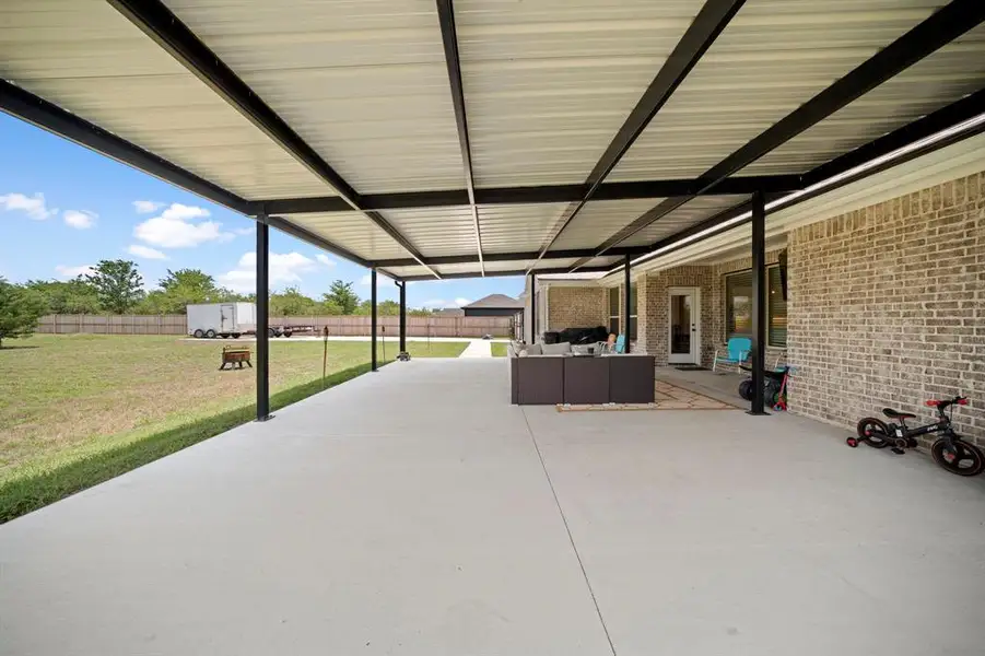 Exterior details and patio area of a home in , Waxahachie (Image 3).