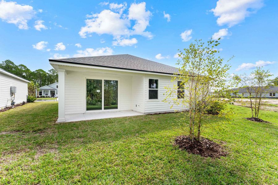 Lot 22 Rear Exterior with Covered Patio at Reserve East in Flagler Beach Lot 22 Rear Exterior with Covered Patio at Reserve East in Flagler Beach