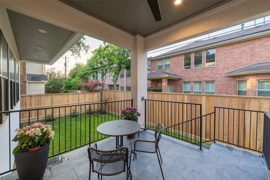 Off the breakfast nook lies a covered patio equipped with a gas line for a future kitchen installation.