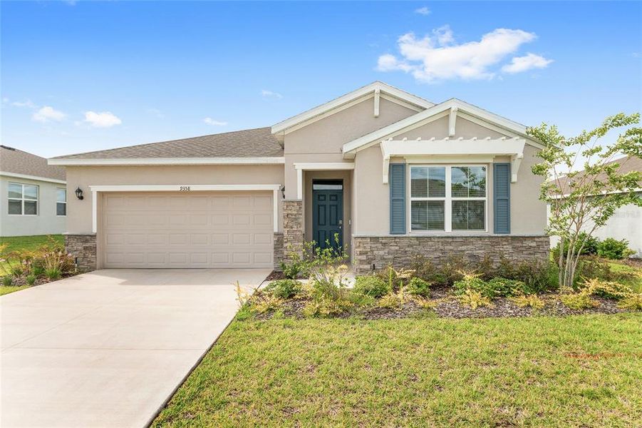 Front exterior of a new home in JB Ranch, Ocala, FL, highlighting curb appeal (Image 29). Front exterior of a new home in JB Ranch, Ocala, FL, highlighting curb appeal (Image 29).